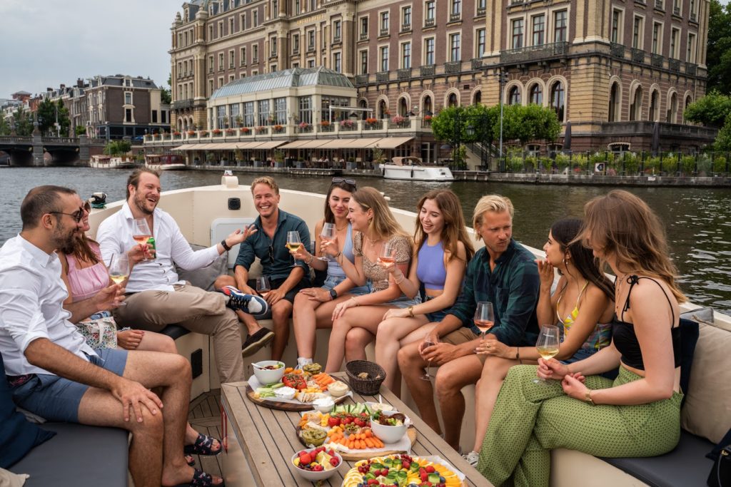 Cheers during Amsterdam booze cruise